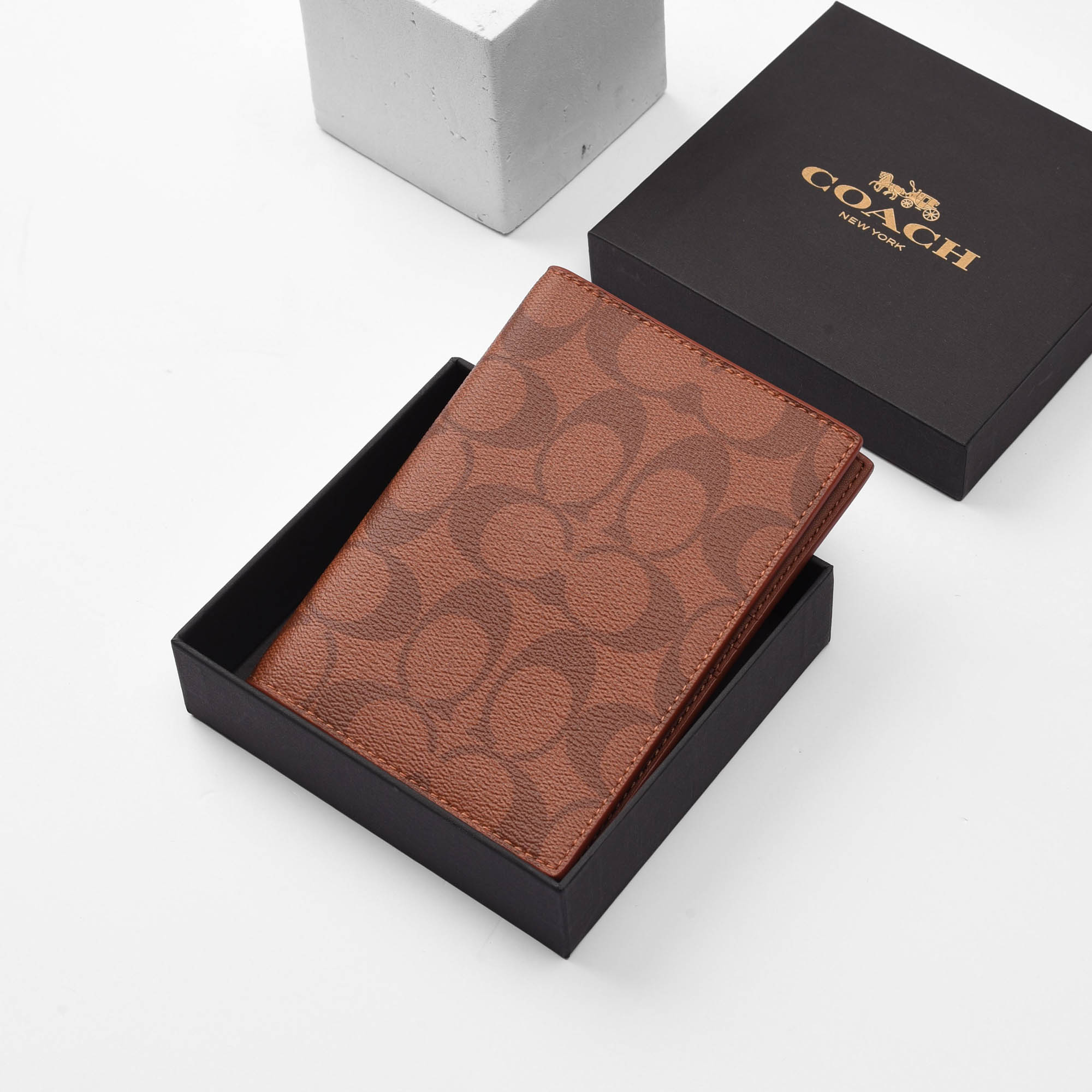 COACH SIGNATURE CANVAS PASSPORT WALLET - ORANGE