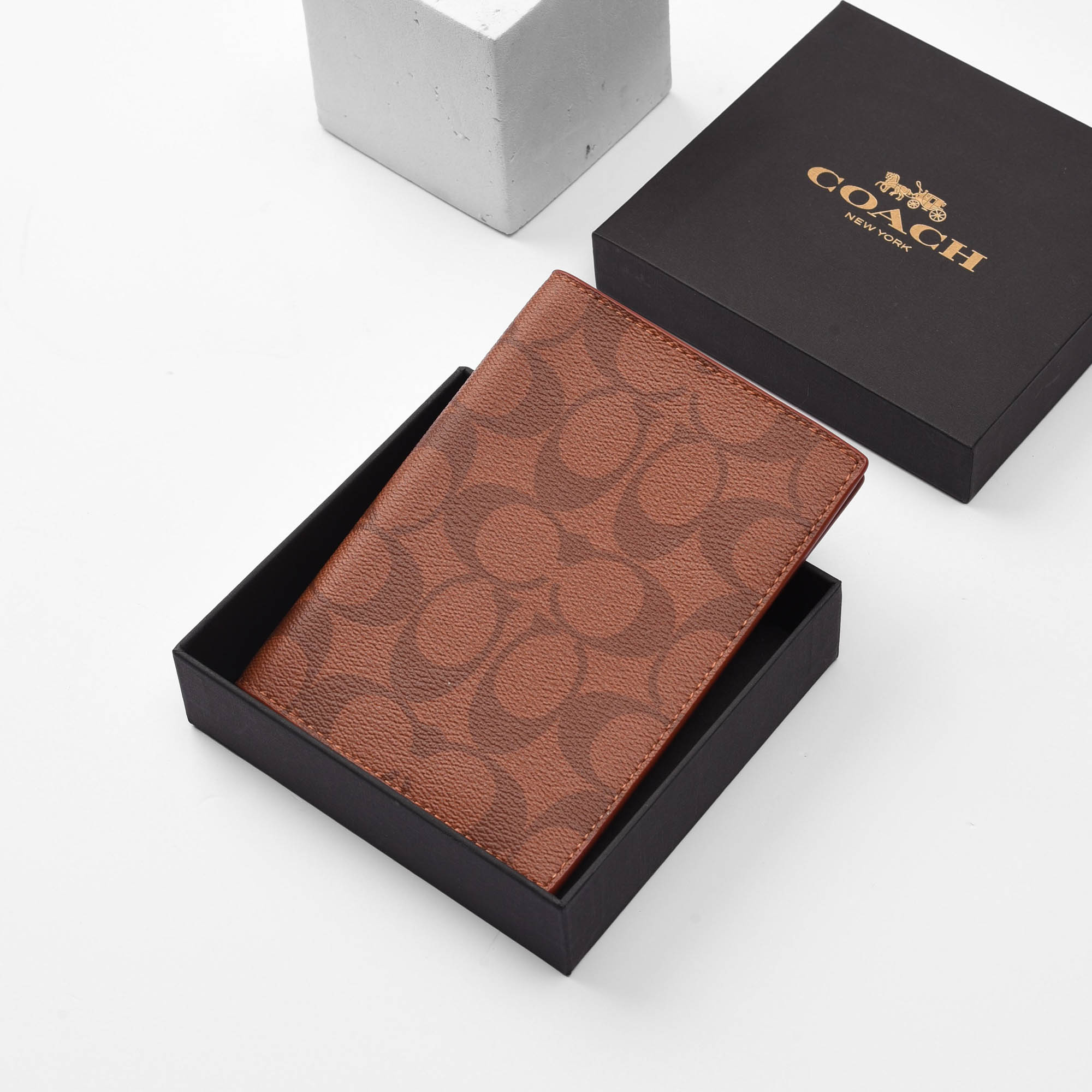 COACH SIGNATURE CANVAS PASSPORT WALLET - ORANGE