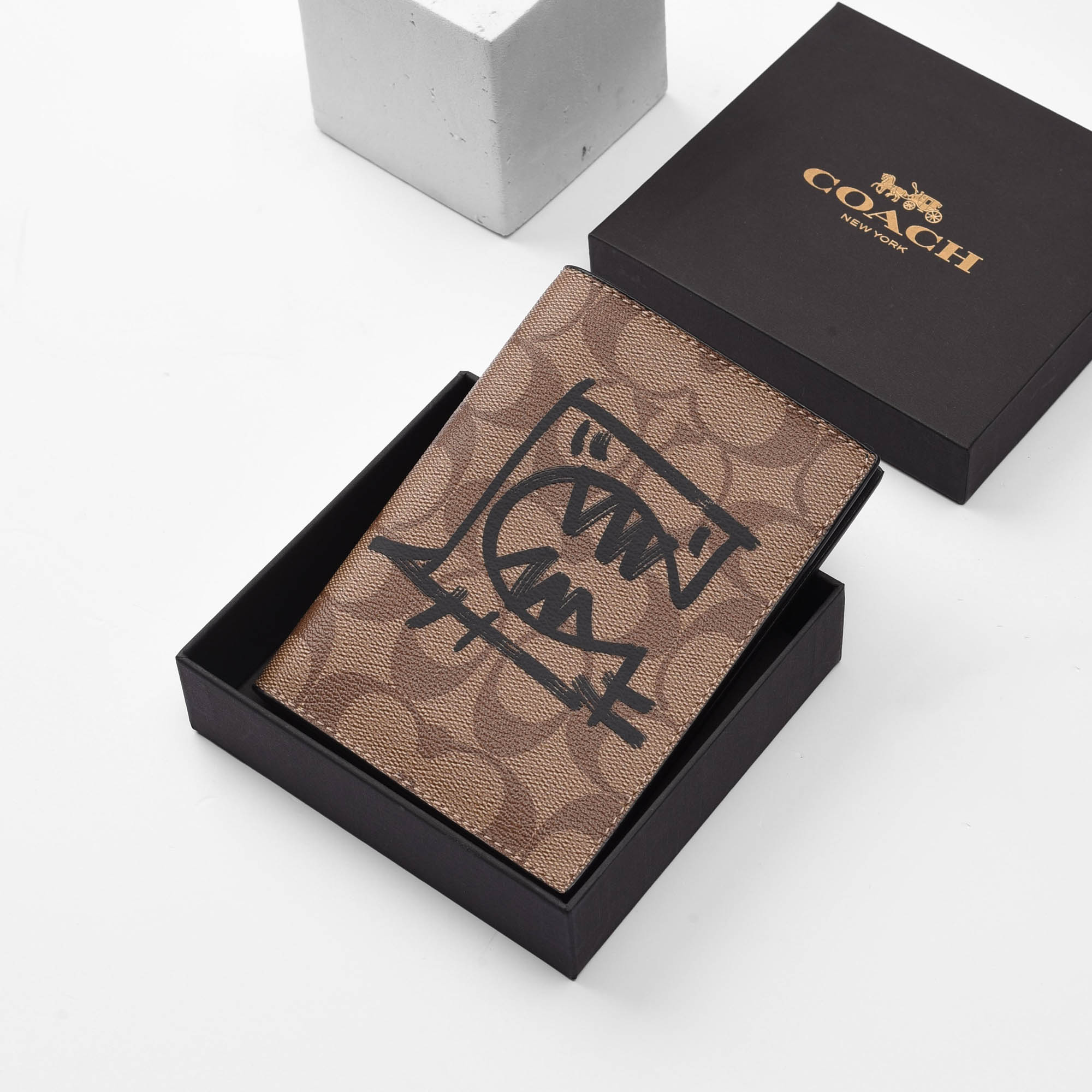 COACH REXY PASSPORT WALLET - BROWN